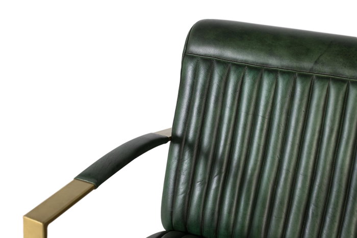 GINER Y COLOMER Sillón tapizado en piel bovina verde con estructura dorada